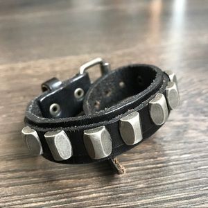 Metal studded bracelet with buckle strap